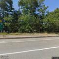 Male slumped over in road near Millbury
