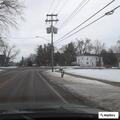 Truck spills gravel and blocks Maple Street roadway