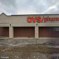 Elderly female lying on ground at pharmacy address