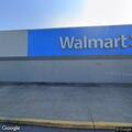 Person sleeping in truck at Walmart parking lot