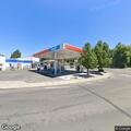 Officer stops vehicle at gas station
