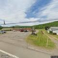 68-year-old woman falls, bleeds from hand in driveway