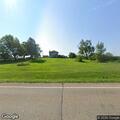 Barn and camp fire on East Michigan Avenue