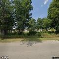 Property check at gas station near I-94