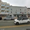 Two people fighting in white sedan in Hull