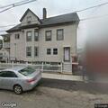 Man yelling threats on front stoop in Quincy