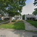 White SUV blocking sidewalk on Currier Street
