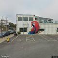 Woman slumped over wheel in blue Prius in front of The Parrot in Hull