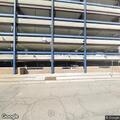 Man passed out but breathing in elevator at parking structure