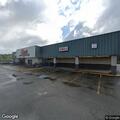 Woman having breathing difficulty and fainting on roadside