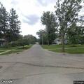Person experiencing abdominal pain on East North Avenue