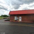 Person found hunched over in car at gas station