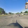 Broken turn signal hanging on Merriman at Cherry Hill