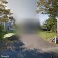 Unresponsive dog reported in backyard on Hill Street