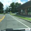 Erratic driving by pickup truck near Pleasant Street