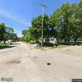 Man having difficulty breathing in driveway