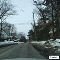 Suspicious person waving at woman on Beacon Street
