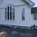 Loose dog reported in front of church