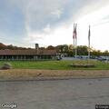 Tree down on lines leaning over Route 140 lanes