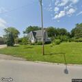 Report of tree fire near house on Green Bay Road