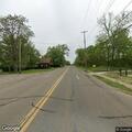 Person with severe headache at West Michigan Ave