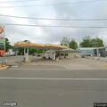 Person in car having chest pain at gas station