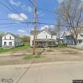 Officer serves court papers at Elm Street apartment