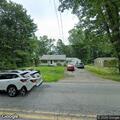 Female with thyroid-related breathing issue at parking lot