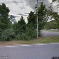 Person unconscious but breathing after vehicle reversed