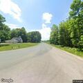Vehicle leaves road and crashes into field