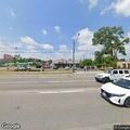Traffic stop on white Ford Mustang at T-Mobile