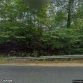 Driver reports gray sedan swerved toward his car