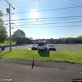 Officers check 911 open line at business lot