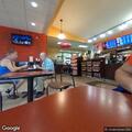 Woman harassing staff at doughnut shop