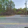 Car hits guardrail and goes into woods on Laurel Street