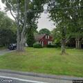 Tree branch blocking roadway on River Drive
