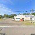 Officer collecting camera footage at storage units