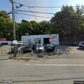 Police vehicle stop near auto sales business
