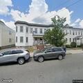 Man screaming obscenities behind Central Ave building