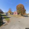 Unconscious man breathing on Mill Street