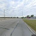 Pickup truck blocking street on 8 Mile Road
