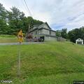 Tree limb blocking road on Route 144