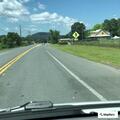 Report of erratic blue pickup towing trailer