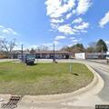 Suspicious SUV left with doors open at car wash