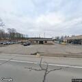 Suspicious person behind gate at rental business