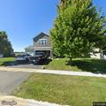 Suspicious person hides behind tree on Ridge Drive