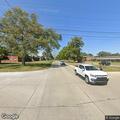 Woman screaming on median at intersection