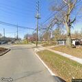 woman experiencing knee pain near shiawassee road