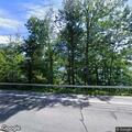 Tree partially blocking northbound lane on West Lake Road