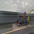 People drinking beer in parked car at McDonald’s